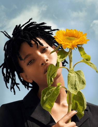Willow Smith picture with a sunflower